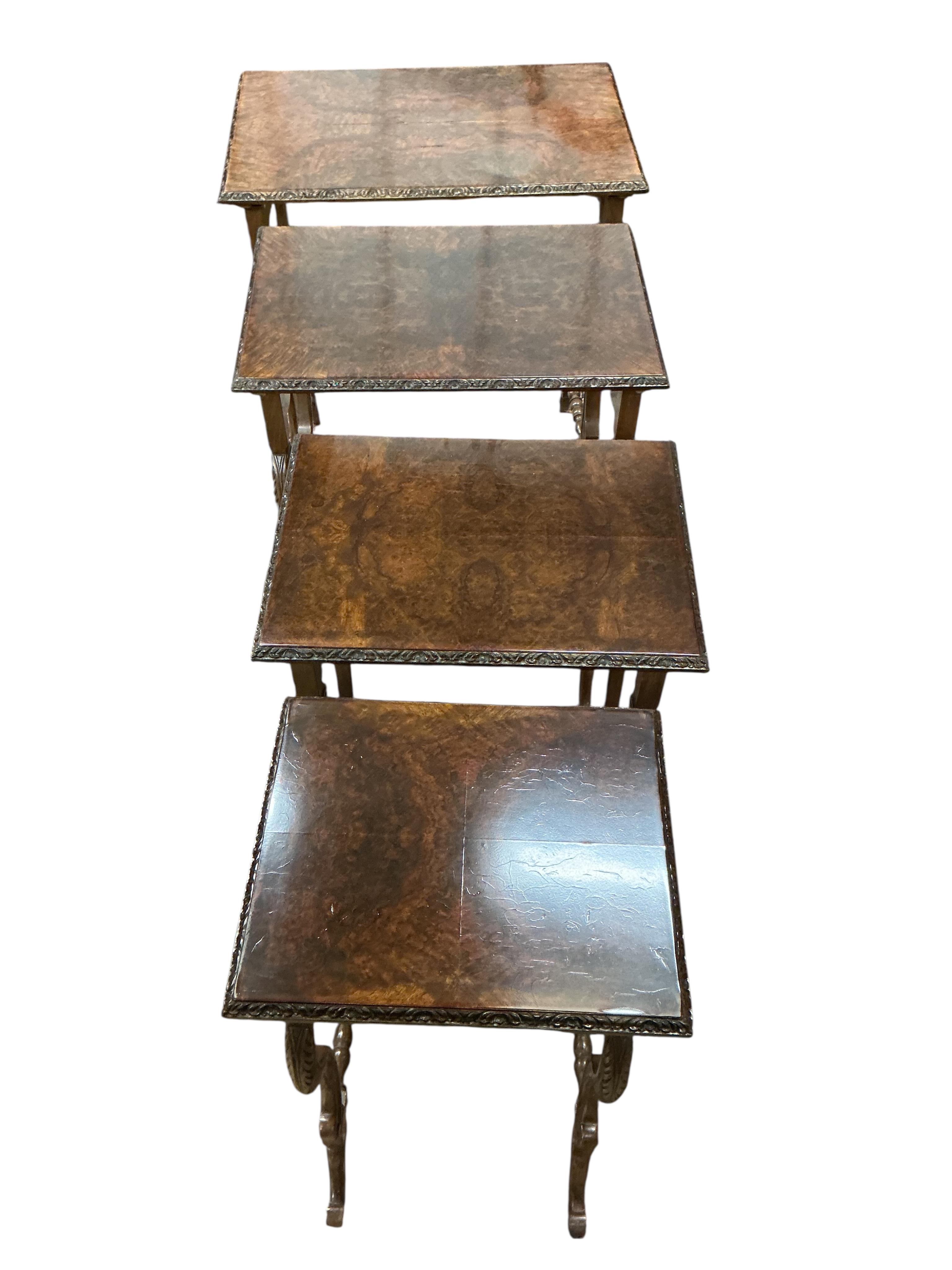A quartetto of early 20th century rectangular burr walnut tables, width 57cm, depth 37cm, height 70cm